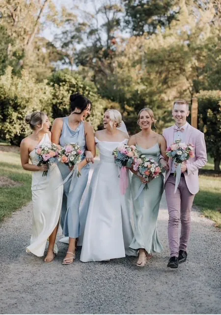 Cassie with her wedding bouquets.